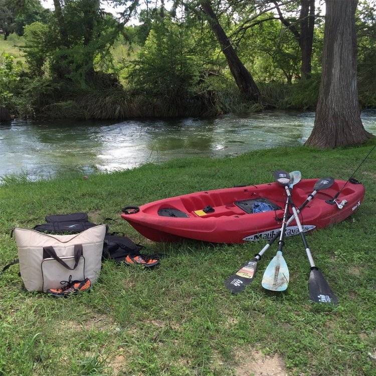Kayak set up along the Sabinal River for a day of paddling